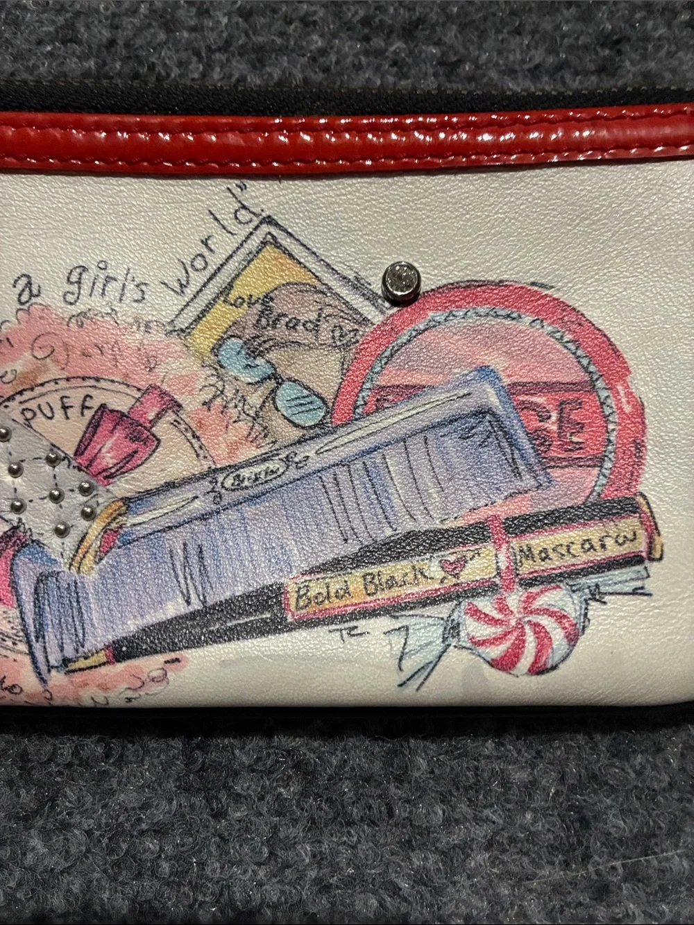 👜 Brighton Cream Cosmetic Pouch with Red Trim and Illustrated Makeup Motif
